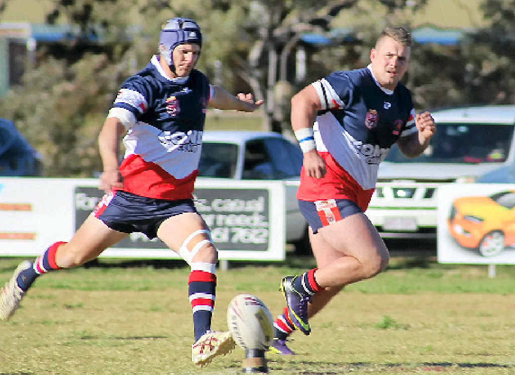 Cowboys Trent Achilles re-starting play after a Gatton try.